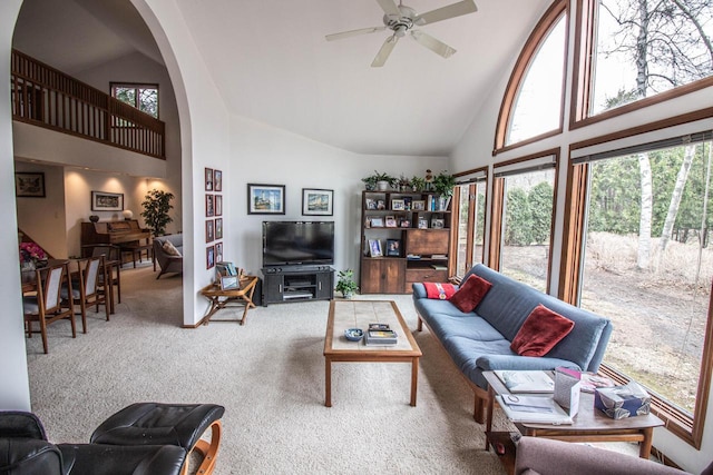 2415 Walnut Grove Ct Unit B, Brookfield, WI 53005 - living area featuring high vaulted ceiling, carpet flooring, ceiling fan, and arched walkways