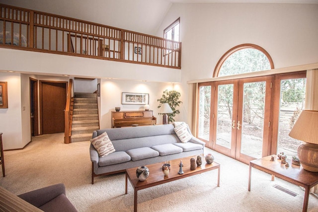 2415 Walnut Grove Ct Unit B, Brookfield, WI 53005 - living room featuring carpet, high vaulted ceiling, plenty of natural light, and stairs