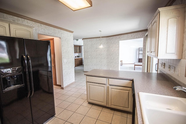 2415 Walnut Grove Ct Unit B, Brookfield, WI 53005 - kitchen with black fridge, a sink, wallpapered walls, a peninsula, and light tile patterned flooring