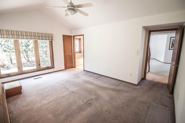 2415 Walnut Grove Ct Unit B, Brookfield, WI 53005 - carpeted spare room with a ceiling fan, vaulted ceiling, and baseboards
