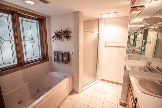 2415 Walnut Grove Ct Unit B, Brookfield, WI 53005 - bathroom featuring a shower stall, a jetted tub, tile patterned flooring, and double vanity