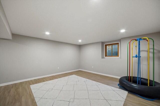 135 Emerald Dr, Mount Pleasant, WI 53406 - exercise area featuring wood finished floors, baseboards, and recessed lighting
