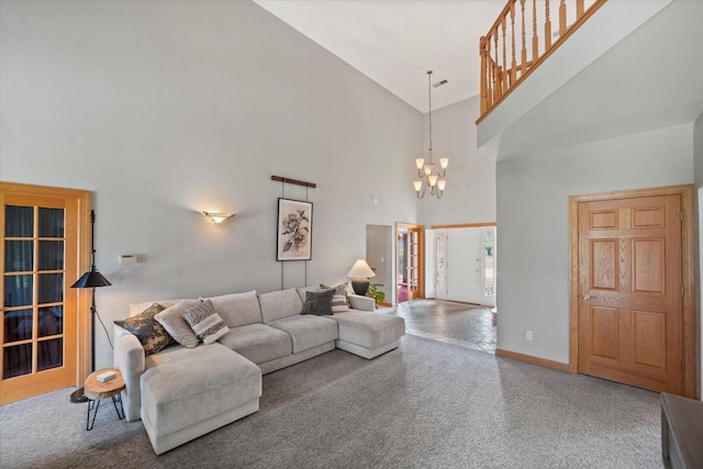 135 Emerald Dr, Mount Pleasant, WI 53406 - living area featuring high vaulted ceiling, carpet, a chandelier, and baseboards