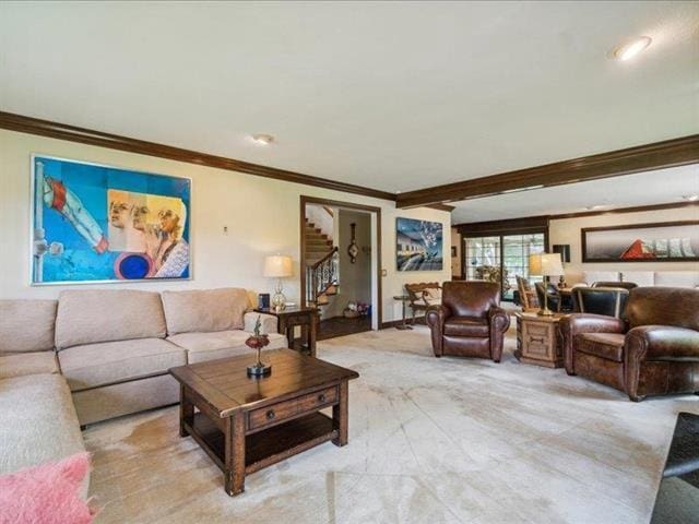 5140 N Kennedy Rd, Milton, WI 53563 - living room featuring ornamental molding, stairway, and light colored carpet