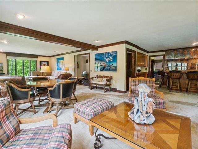 5140 N Kennedy Rd, Milton, WI 53563 - living area with crown molding, light carpet, and recessed lighting