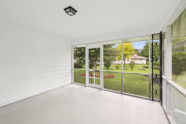 6013 Gateway Grn, Monona, WI 53716 - unfurnished sunroom with concrete flooring