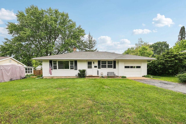 6013 Gateway Grn, Monona, WI 53716 - single story home featuring an attached garage, driveway, a chimney, and a front yard