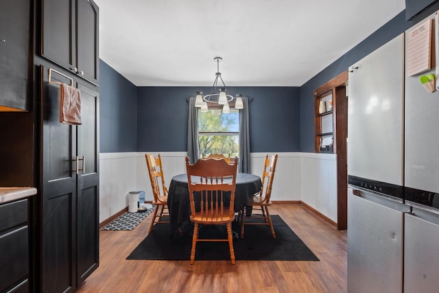 841 Legion Dr, Twin Lakes, WI 53181 - dining space featuring wainscoting and wood finished floors