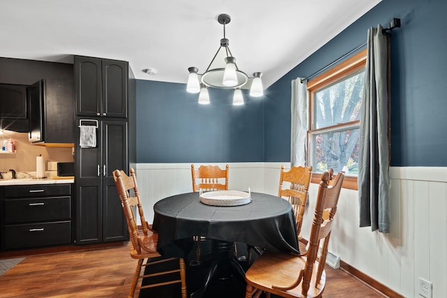 841 Legion Dr, Twin Lakes, WI 53181 - dining room featuring wainscoting and dark wood finished floors