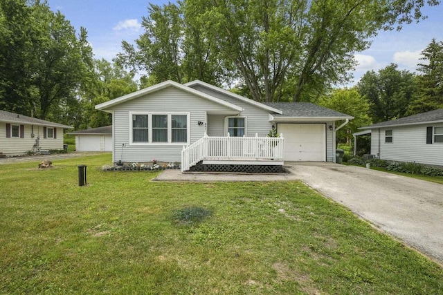 841 Legion Dr, Twin Lakes, WI 53181 - ranch-style home with driveway, a garage, a front yard, and a porch