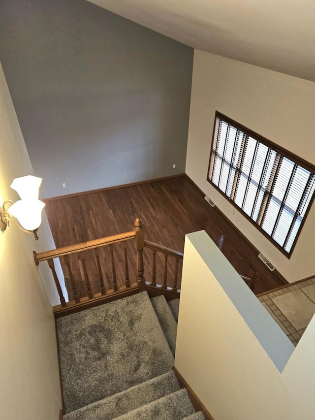 1983 US Highway 2, Florence, WI 54121 - staircase with baseboards and wood finished floors