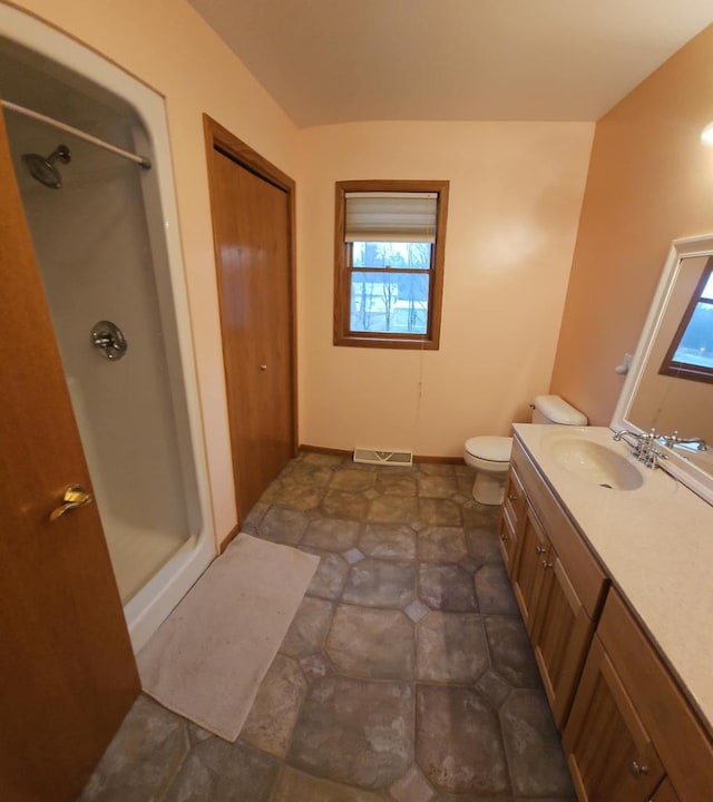 1983 US Highway 2, Florence, WI 54121 - bathroom with a stall shower, vanity, and toilet