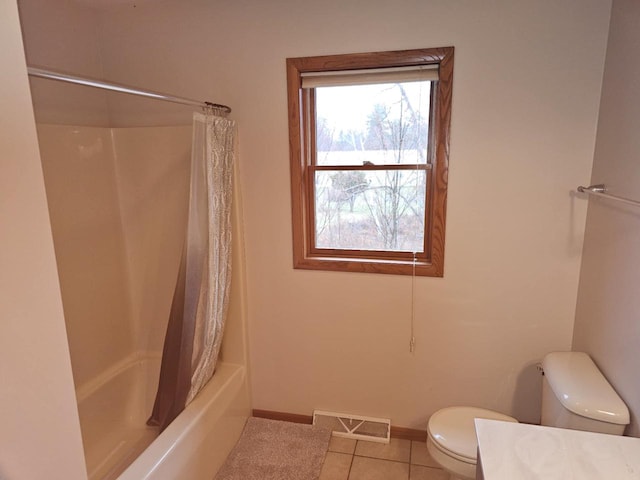 1983 US Highway 2, Florence, WI 54121 - bathroom with toilet, baseboards, tile patterned floors, shower / bath combo, and vanity