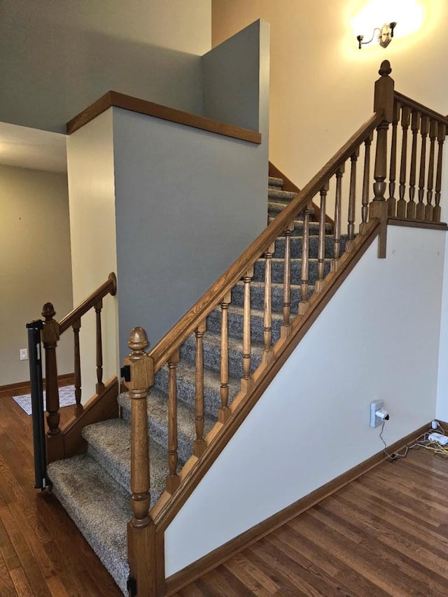 1983 US Highway 2, Florence, WI 54121 - stairs featuring wood finished floors and baseboards