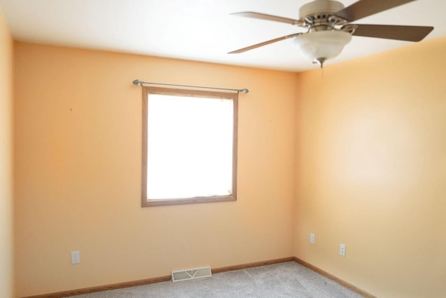 1983 US Highway 2, Florence, WI 54121 - empty room with baseboards, ceiling fan, and light carpet