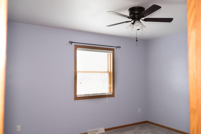 1983 US Highway 2, Florence, WI 54121 - empty room with carpet flooring, baseboards, and ceiling fan