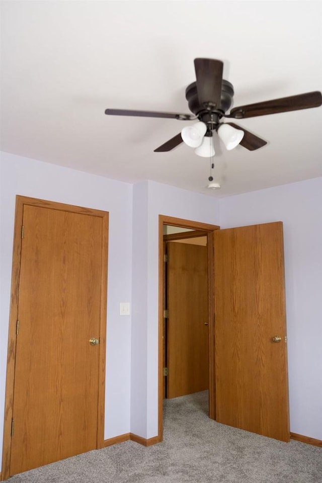 1983 US Highway 2, Florence, WI 54121 - unfurnished bedroom with carpet floors, baseboards, and ceiling fan