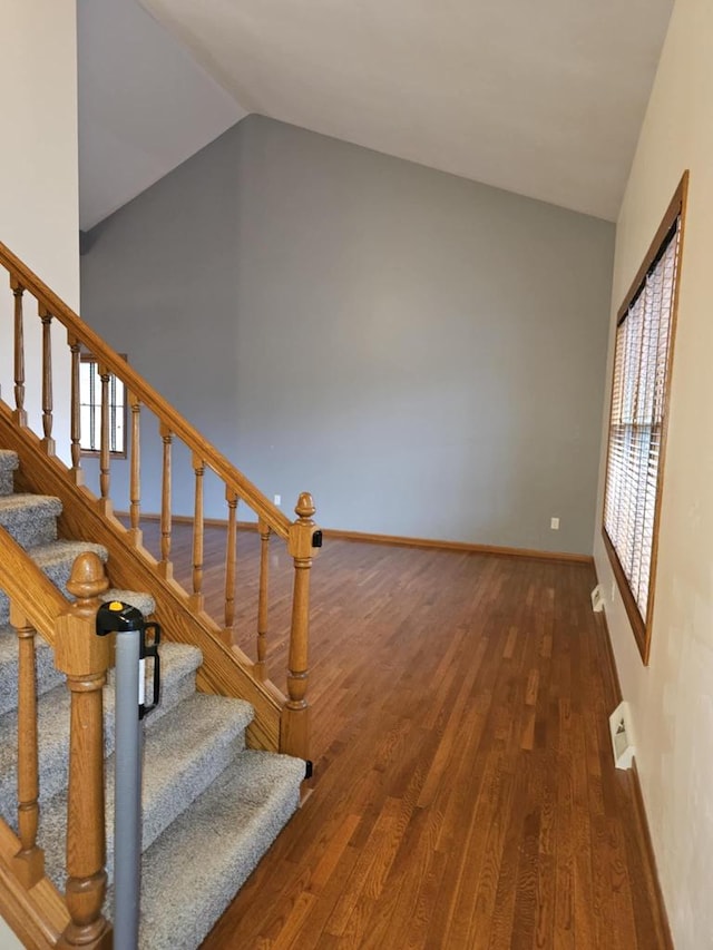 1983 US Highway 2, Florence, WI 54121 - stairway with lofted ceiling, wood finished floors, and baseboards