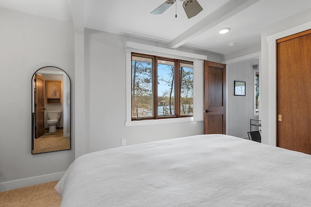 9331 N Marl Lake Rd, Pound, WI 54161 - carpeted bedroom with beam ceiling, baseboards, and ceiling fan