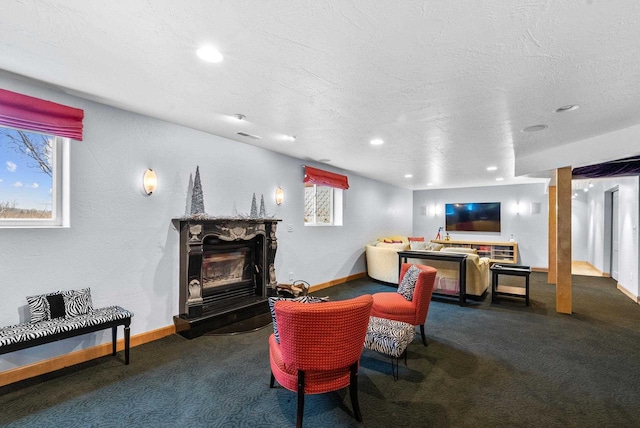 W4344 Carl Dr, Fond Du Lac, WI 54937 - carpeted living room with baseboards, a fireplace, and recessed lighting