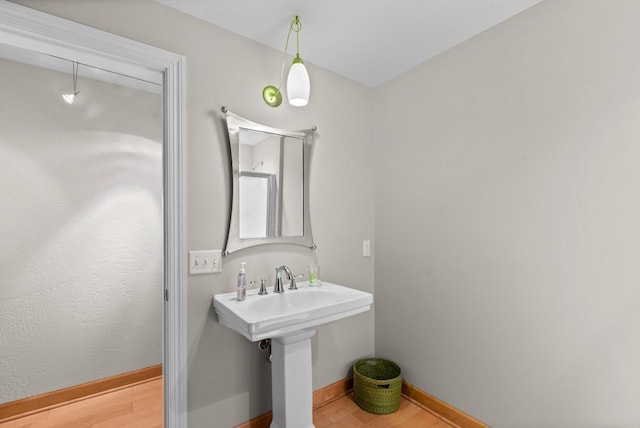 W4344 Carl Dr, Fond Du Lac, WI 54937 - bathroom featuring wood finished floors and baseboards