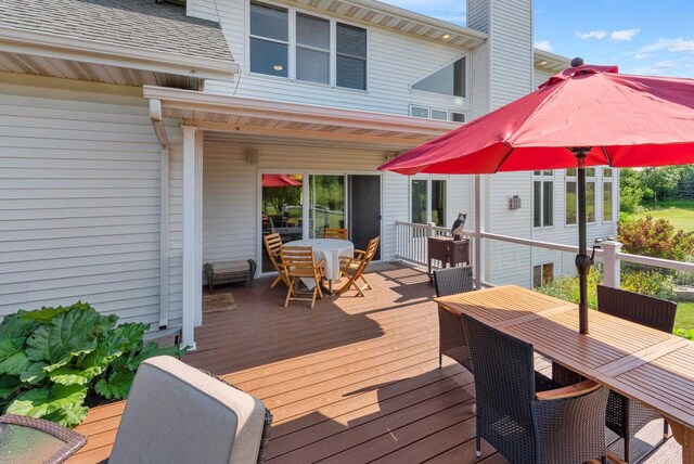 W4344 Carl Dr, Fond Du Lac, WI 54937 - wooden terrace featuring outdoor dining space