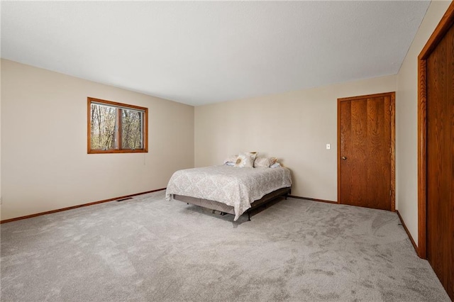 1395 25th St, Houlton, WI 54082 - carpeted bedroom with baseboards and a closet