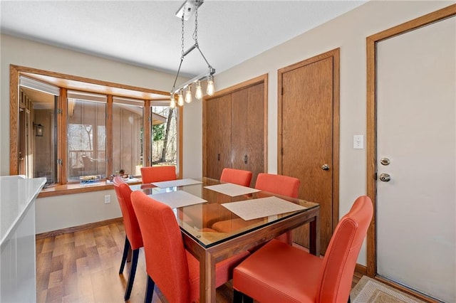 1395 25th St, Houlton, WI 54082 - dining space featuring light wood-style flooring
