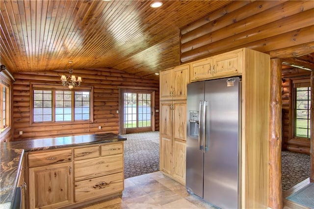 N3858 1000th St, Eau Claire, WI 54703 - kitchen featuring stainless steel fridge with ice dispenser, dark countertops, a chandelier, vaulted ceiling, and plenty of natural light