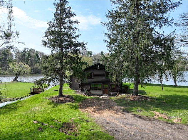 N3858 1000th St, Eau Claire, WI 54703 - view of home's community with a water view, a lawn, and driveway