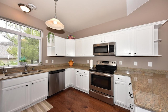 18235 W Wisconsin Ave, Brookfield, WI 53045 - kitchen featuring stainless steel appliances, open shelves, a sink, white cabinetry, and vaulted ceiling