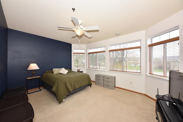 18235 W Wisconsin Ave, Brookfield, WI 53045 - bedroom featuring light colored carpet, baseboards, and a ceiling fan