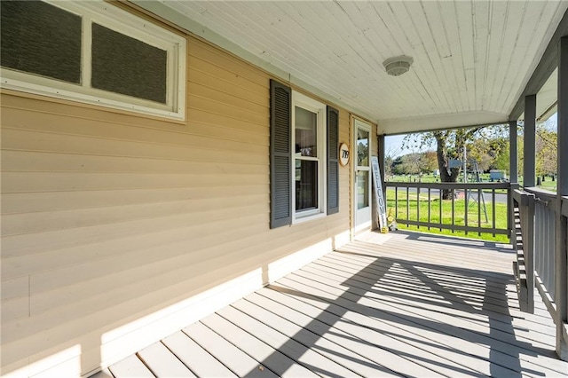 719 Huebsch Blvd, Eau Claire, WI 54701 - deck featuring a porch