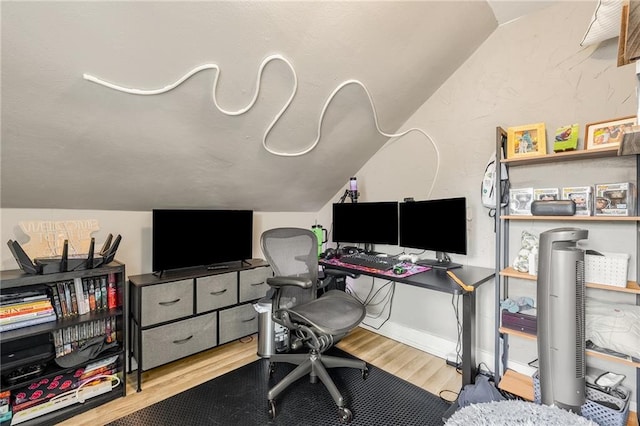719 Huebsch Blvd, Eau Claire, WI 54701 - office space featuring vaulted ceiling and wood finished floors
