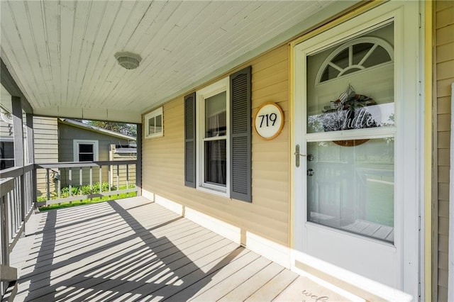 719 Huebsch Blvd, Eau Claire, WI 54701 - wooden terrace with a porch
