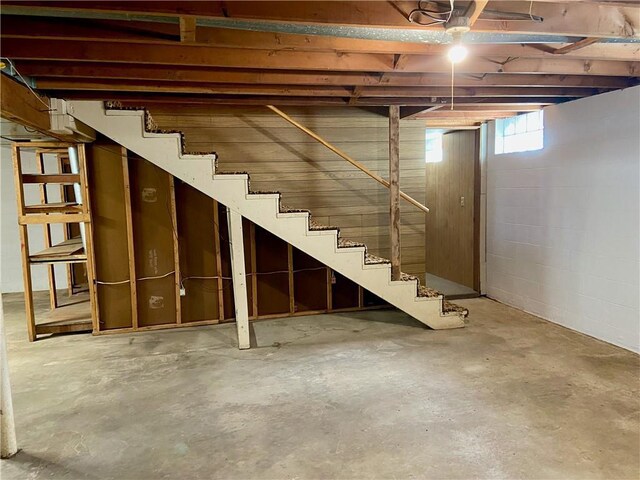 318 Spruce St, Spooner, WI 54801 - below grade area featuring stairway