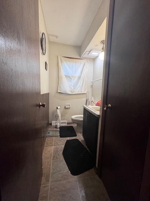 10547 W Wabash Ave Unit 10549, Milwaukee, WI 53224 - bathroom featuring vanity, toilet, and baseboards