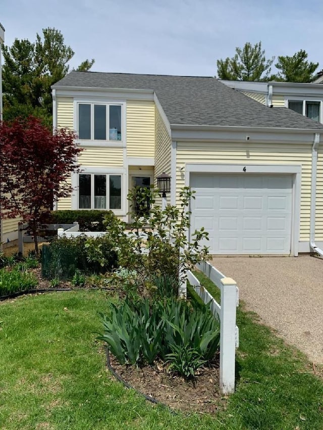 4 Red Cedar Trl, Madison, WI 53717 - view of front facade with driveway, a garage, a front lawn, and roof with shingles