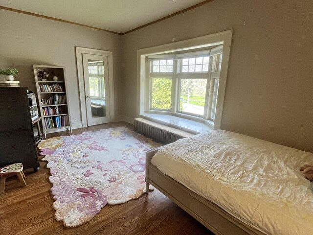 2701 N Lake Dr, Milwaukee, WI 53211 - bedroom with crown molding and wood finished floors