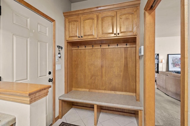 mudroom with light tile patterned floors