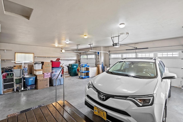 garage featuring a garage door opener