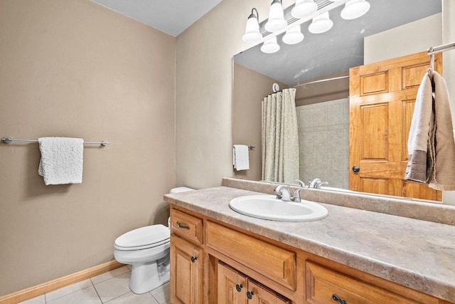 bathroom with tile patterned floors, toilet, a shower with curtain, vanity, and baseboards