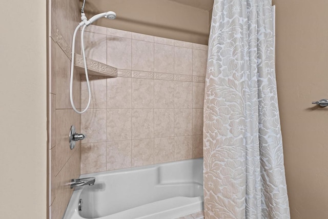 full bathroom with shower / tub combo