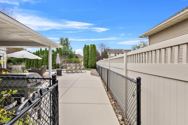 view of patio / terrace featuring fence and outdoor dining space