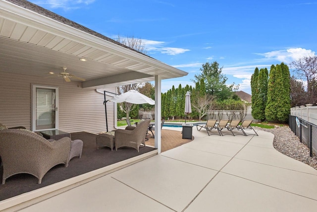 view of patio / terrace featuring ceiling fan and a fenced backyard