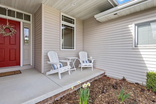 entrance to property featuring a porch