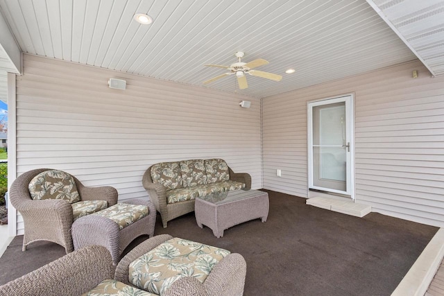 view of patio / terrace featuring ceiling fan and an outdoor living space