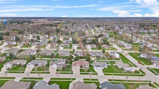 aerial view of property's location featuring nearby suburban area