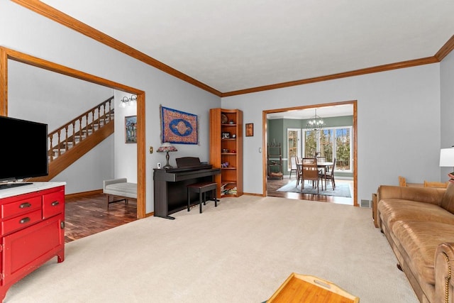 3311 S Scarlet Oak Ln, Appleton, WI 54915 - living area with a chandelier, carpet, crown molding, baseboards, and stairs