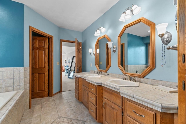 3311 S Scarlet Oak Ln, Appleton, WI 54915 - bathroom with double vanity, tile patterned flooring, and a relaxing tiled tub